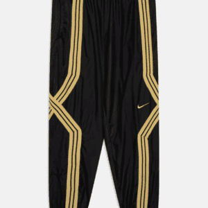 Nike Performance CROSSOVER PANT UNISEX - Pantalon de survêtement "Noir/Or"